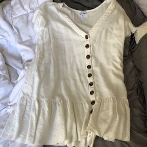 White dress with brown buttons